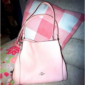 Pink Coach purse.